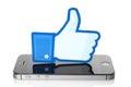 Facebook thumbs up sign on iPhone on white background