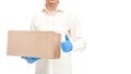 Faceless deliveryman hands in gloves hold parcel label eco cardboard box and showing approving gesture class thumbs up.