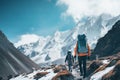 Faceless Group of climbers walks through snow covered mountains, back view