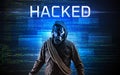 Faceless hacker on code background Royalty Free Stock Photo