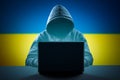 Faceless hooded anonymous computer hacker on Ukrainian flag background. Internet crime and electronic banking security. Anonymous Royalty Free Stock Photo