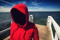 Faceless Hooded Unrecognizable Woman at Ocean Pier, Abduction Co