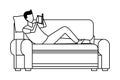 Faceless man reading sofa in black and white
