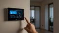 A faceless person using an advanced smart home hub to control lighting and appliances