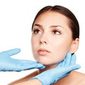 Facelift hydra treats. Esthetic skin care analysis. Doctor hands in gloves.