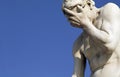 Facepalm - statue with head in hand