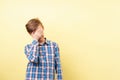 Facepalm, desperate boy covering face with hand Royalty Free Stock Photo