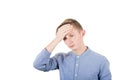 Facepalm embarrassment and shame emotion. Ashamed teen boy covering his forehead with a hand. Desperate young lad portrait