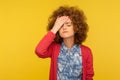 Facepalm. Portrait of depressed woman with curly hair slapping forehead in regret gesture, blaming herself
