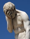 Facepalm statue in Paris against the blue sky Royalty Free Stock Photo