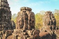 Faces of the Bayon temple in Siem Reap near Angkor Wat in Cambodia Royalty Free Stock Photo