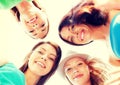 Faces of girls looking down and smiling Royalty Free Stock Photo