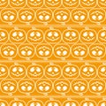 White muzzles of pumpkins on an orange background