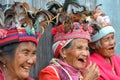 Faces of three unknown old smiling ifugao women in traditional costume near rice terraces. Banaue, Luzon Royalty Free Stock Photo