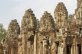 Faces on towers at Bayon Temple in Angkor Tom, Siem Reap, Cambodia Royalty Free Stock Photo