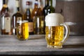 Faceted glass of light beer with foam Royalty Free Stock Photo