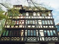 Fachwerk timber framed house in Colmar city, France, Alsace. Traditional architecture medieval home facade, historic town.