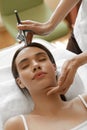 Facial Beauty Treatment. Woman Getting Oxygen Skin Peeling Royalty Free Stock Photo