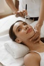 Facial Beauty Treatment. Woman Getting Oxygen Skin Peeling Royalty Free Stock Photo