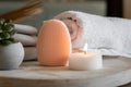 Facial cleansing brush and massager, towel and candle, skin care beauty concept, with free space for text