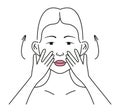 Facial massage. Facial skin care at home. Beautiful girl applies cream, tonic, gel on the skin.