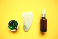 Facial massage kit. gua sha massager, serum, capsules and flower