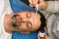 Facial massage for man Royalty Free Stock Photo