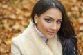 Facial portrait of a beautiful arab woman warmly clothed outdoor