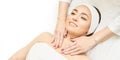 Facial salon massage. Woman professional therapy. Hands at neck. Healthy cosmetic procedure. Luxury spa treatment