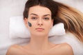 Facial Skin Care. Beautiful Woman Getting Cosmetic Mask In Salon Royalty Free Stock Photo