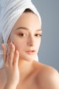 facial skincare acne treatment woman touching face Royalty Free Stock Photo