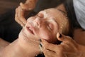 Facial Treatment. Resting Woman On Skin Care Procedure.