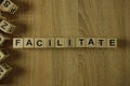 Facilitate word from wooden blocks