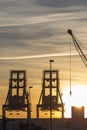 Partial view of the port of Sagunto at sunrise, cranes of the po Royalty Free Stock Photo