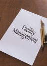 Facility management writen on paper