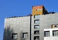 Facing of the building ventilated facade. Royalty Free Stock Photo