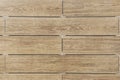 Facing the building with a ventilated facade. Wood texture, brown wood pattern. Close-up background Royalty Free Stock Photo