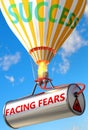 Facing fears and success - pictured as word Facing fears and a balloon, to symbolize that Facing fears can help achieving success