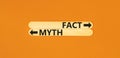 Fact or myth symbol. Concept word Myth and Fact on beautiful wooden stick. Beautiful orange table orange background. Business and Royalty Free Stock Photo