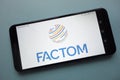 Factom FCT cryptocurrency logo displayed on smartphone