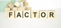 Factor word on block concept on a light Royalty Free Stock Photo