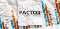 FACTOR word text on the white memo note crupled sticker on chart background
