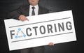 Factoring poster is held by businessman