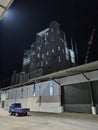 Factory building progress with low angle at night Royalty Free Stock Photo