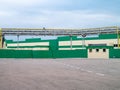 Factory buildings with green and white Exterior. Industrial concept