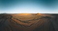 Factory Butte in the Caineville Badlands of Utah. Aerial drone panorama during sunrise. Royalty Free Stock Photo