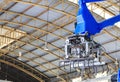 Factory 4.0 concept: View of fork gripper on palletizing robot in smart warehouse