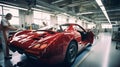 Factory construction engineering works of a modern red sport car in big workshop. Generative AI Royalty Free Stock Photo