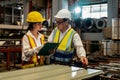 Factory engineer conduct quality control on metal product. Exemplifying Royalty Free Stock Photo