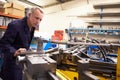 Factory Engineer Operating Hydraulic Tube Bender Royalty Free Stock Photo